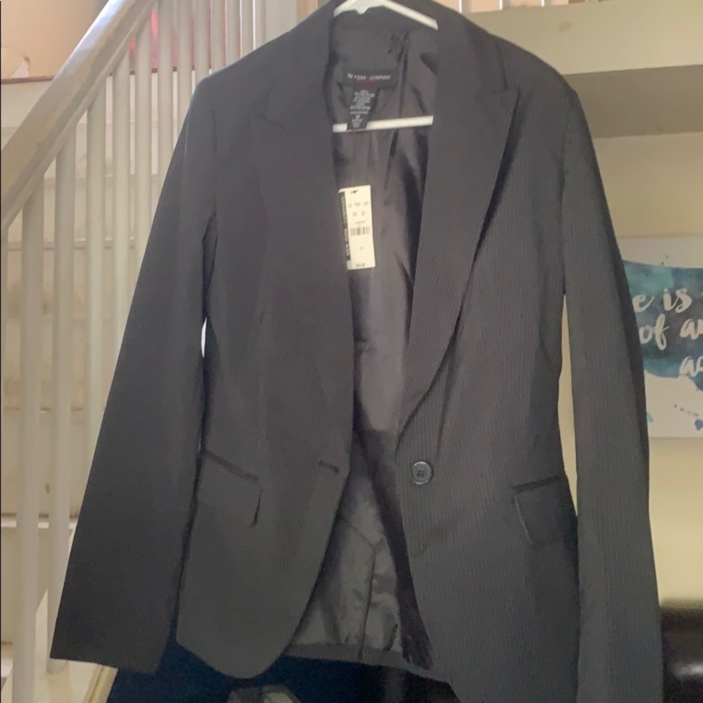 Blazer. Black with thin white pinstripes
